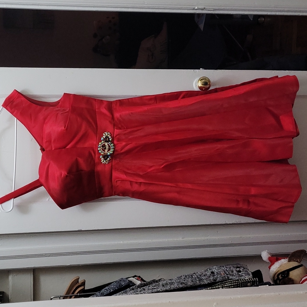 Never worn evening dress with sparkling brooch